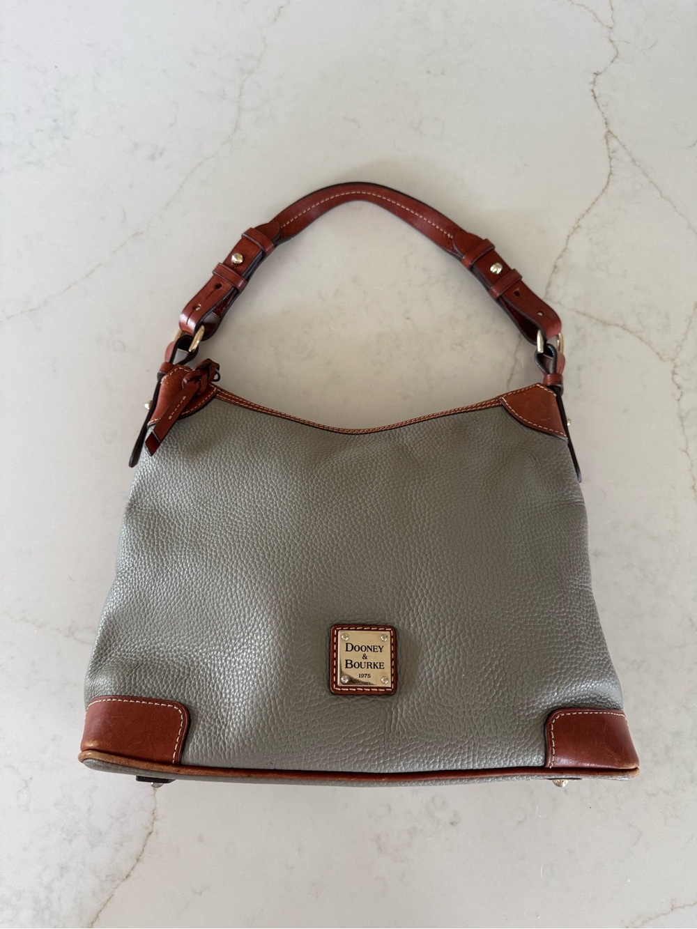 Dooney & Bourke Gray Pebbled Leather Shoulder Bag with Brown Trim and Handle